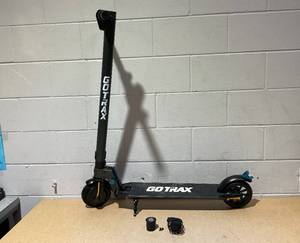 lot 38 image: Gotrax G2Plus Foldable Electric Scooter for Adult Teens Age of 8 with 6 Tires  a top speed of up to 12 MPH (Slightly Used)