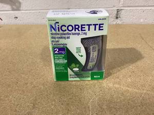 lot 447 image: Nicorette Mini Nicotine Lozenges Stop Smoking Aid 2 Mg Mint - 81 Ct