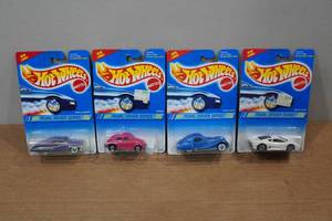 lot 20 image: 4 Hot Wheels Pearl Driver Series - Pearl Passion, VW Bug, Talbot Lago, Jaguar XJ220