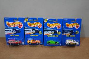lot 33 image: 4 Hot Wheels - Chevy Lumina, 80s Firebird, Pontiac Feiro 2M4, Ford Aerostar
