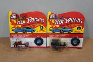 lot 43 image: 2 Hot Wheels 25th Anniversary with Matching Button - Red Baron, Paddy Wagon