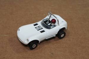 lot 67 image: Vintage Aurora Cheetah HO Scale Slot Car