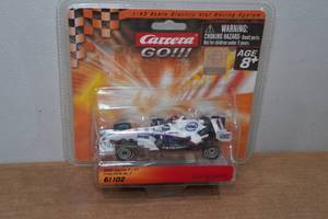 lot 74 image: Vintage Carrera Go BMW Sauber 143 Scale Slot Car