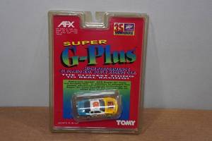 lot 77 image: Vintage Tomy Super G-Plus HO Scale Slot Car