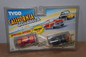 lot 78 image: Vintage Tyco Twin Pack 57 Chevy & 40 Ford Coupe HO Scale Slot Cars