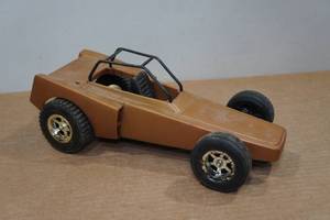 lot 159 image: Vintage Cox Sandblaster Dune Buggy Gas-Powered Tether Car