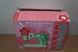 lot 239 image: Hello Kitty Sewing Machine - No Cord