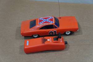 lot 293 image: Vintage Dukes of Hazzard General Lee Remote Control Car