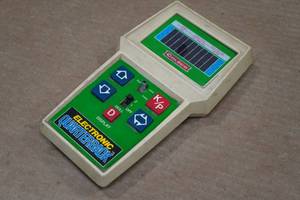 lot 340 image: Vintage Hand Held Electronic Quarterback Game