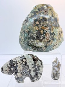 lot 85 image: Ocean Jasper Misc. Lot of 3 large one side polished slab 812 gm.1 lb 12.6 oz., Zuni Bear 187 gm.6.6 oz., and tower 22 gm..8 oz.