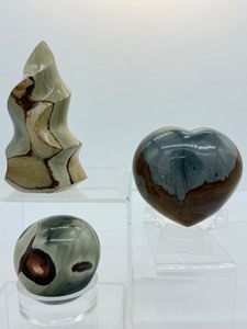 lot 111 image: Polychrome Jasper polished set of 3 flame 220 gm.7.8 oz., heart 292 gm. 10.3 oz., gallot 123 gm.4.3 oz.