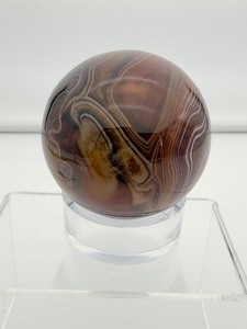 lot 60 image: Sardonyx Sphere 252 gm.9 0z.