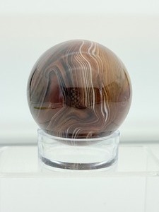 lot 60 image: Sardonyx Sphere 252 gm.9 0z.