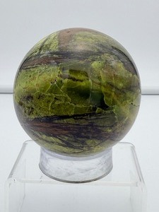 lot 105 image: Green opal Sphere 75mm 823 gm.1 lb.13 oz.