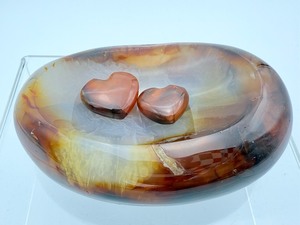 lot 37 image: Carnelian Bowl with 2 small, polished hearts 347 gm.12.2 oz.