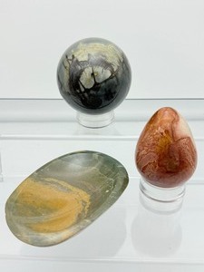 lot 206 image: Polychrome Jasper Polished misc. lot of 3 sphere 62mm, 344 gm.12 oz., bowl 201 gm. 7.1 oz., egg 134 gm.4.9 oz.