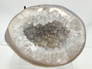 Agate Geode half polished with black metal stand, Weight 2lbs. 10 ounces, 1.2 kilo