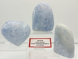 lot 125 image: Blue Calcite Polished Lot of 3 Freeform 867 gm.1 lb. 15 oz., freeform 379 gm.13.4 oz., heart 480 gm.1 lb. 1 oz.