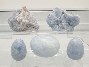 lot 199 image: Blue Calcite Mixed Misc. Lot of 5 two rough chunks, one palmstone and two eggs 517 gm.1 lb. 2 oz.