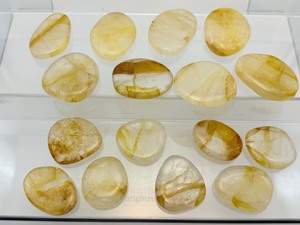 lot 132 image: 16 Golden Healer Palmstones 480 gm. 1 lb.