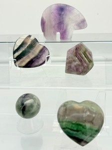 lot 107 image: 5 piece Polished Fluorite Misc. Lot Rainbow Zuni bear 141 gm.5 oz., puffy rainbow heart 79 gm.2.8 oz., rainbow sphere 40 gm1.5 oz., rainbow geometric shape 41 gm. 1.5 oz. & rainbow heart cabochon 66 gm.2.3 oz.