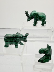 lot 197 image: Malachite Animal Figures Lot of 3 two elephants and one horsemule head 77 gm.2.7 oz.