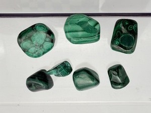 lot 92 image: 7 Malachite tumbles 109 gm.3.8 oz.