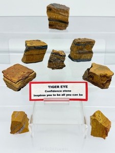 lot 188 image: Tigers eye rough chunk lot of 8 321 gm.11.3 oz.