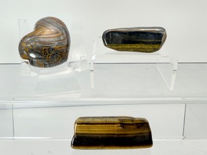 lot 257 image: Tigers Eye Polished Lot of 3 heart and two long pieces 149gm.5.3oz.