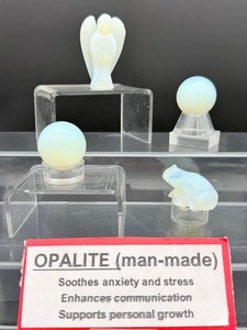 lot 281 image: Opalite  (Man-Made) Polished Lot of 4 angel, two small spheres and a frog   Total lot weight 142gm5.2oz.