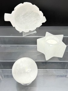lot 68 image: Selenite (Misc. Lot of 3) Sphere 75mm 504 gm1 lb.2 oz., Leaf Dish 448 gm.1 lb., Tealight Star Holder 378 gm.13.3 oz.