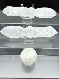 lot 51 image: Selenite Lot of 3 Two healing daggers 373 gm.13.2 oz. and sphere 183 gm.6.4 oz. Total lot weight 560 gm.1 lb. 4 oz.