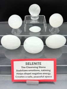 lot 135 image: Selenite Polished Lot of 7 2 spheres 222 gm.7.8 oz., 3 gallets 301 gm.10.6 oz., small palmstone 19 gm..7 oz. Total Lot Weight 542 gm.19.1 oz.