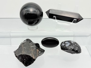 lot 219 image: Black Obsidian Misc. Lot of 5 sphere 51mm 200 gm.7 oz., double terminated wand 69 gm.2.4 oz, 2 rough chunks & small palmstone 199 gm.7 oz.