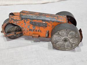 lot 17 image: Vintage Orange Metal Toy Steamroller marked DIESEL