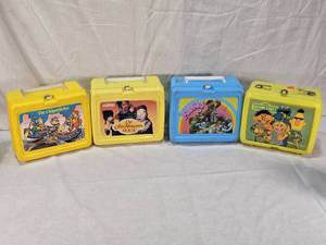 lot 28 image: Lot of Vintage Lunchboxes Including The Chipmunks, Jim Henson, Muppets, and Sesame Street