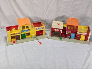 lot 40 image: Fisher-Price Playsets - Family Village with Theater and Fire Hall, Also Police Station, Garage, Barber Shop