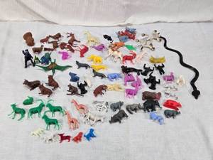 lot 62 image: Assorted Plastic Animal Figures, Dinosaurs, Gorillas and More