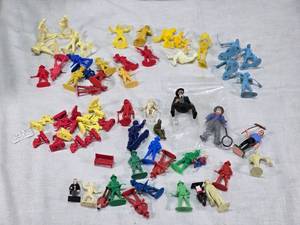 lot 69 image: Lot of Vintage Plastic Figures Including Cowboys, Farmers, and Sports Players including Tudor Tru-Action Football Players