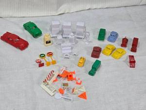 lot 70 image: Toy Cars and Accessories Set including Gas Pumps, Signs, and Vehicles