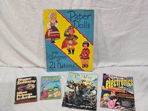 lot 89 image: Paper Dolls with Costumes of 21 Nations Uncut, Roger Zelaznys Nine Princes in Amber, The Flintstones The Great Pizza Robbery, Zombie B.C. No. 1, and Electronics Comic Book