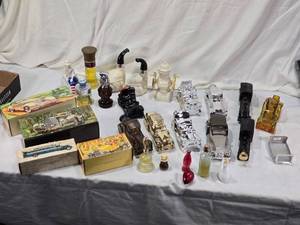 lot 102 image: Large Avon Collectible Car and Novelty Bottles Some With Boxes and Unique Shapes like Pipes