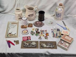 lot 104 image: Vintage Collectibles including Elbow Lake Co-op Grain Jug and Pitcher, Henry McKenna Whiskey Jug, Pens, Lions Pins and Assorted Memorabilia