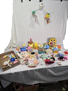 lot 118 image: Vintage and Modern Toys Collection including Disney Mobiles, Tomy Toys, and Fisher-Price Carousel