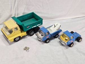 lot 146 image: Structo Hydraulic Dump Truck, Tonka Tow Truck, and Tonka Semi Cab with Accessories