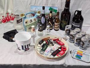 lot 154 image: Beer Collectibles and Memorabilia Lot including Coors Light, Budweiser, Schlitz Items, High Life, JR Beer Six Pack, Keychains, Jim Beam New Mexico Decanter and More