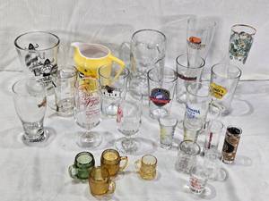 lot 163 image: Lot of Various Glassware and Mugs Including Tuborg Gold Mug, White Horse Whiskey Pitcher, and Linds Tavern Glass
