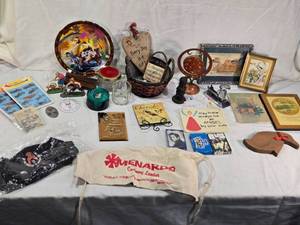 lot 172 image: Warner Bros. Plate with Tasmanian Devil and She-Devil, Menards Lumber Apron, Small Brass Gong with No Mallet, Glass Jar and More