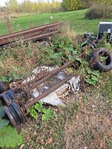 lot 118 image: 4- Trailer House Axles, Rims, Tires & Frame