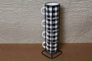 lot 8 image: Set of 4 Black and White Buffalo Plaid Stacking Espresso Cups with Metal Stand